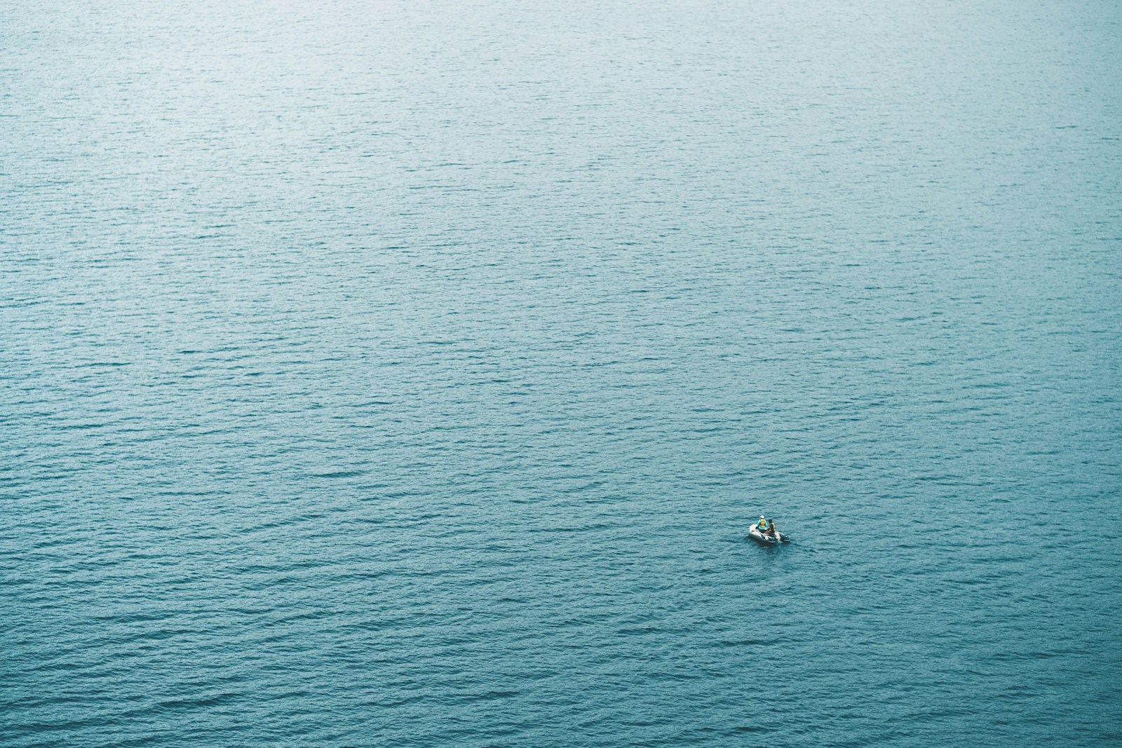 person in boat sailing at daytime